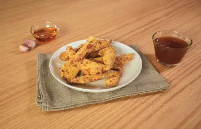 Tiras de pollo con salsa de miel y ajo